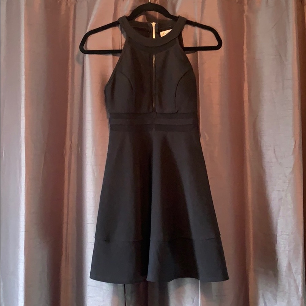 Black halter top dress with mesh detailing
